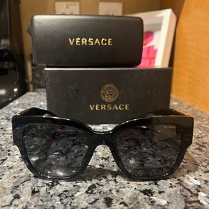 Woman’s Black Versace Sunglasses